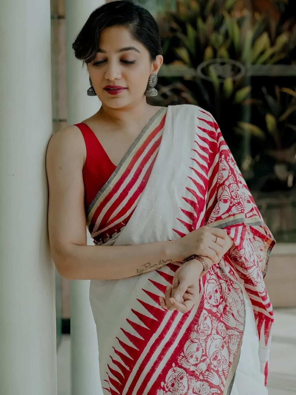Trending Off-White & Red Linen Saree with Traditional Folk Art Print
