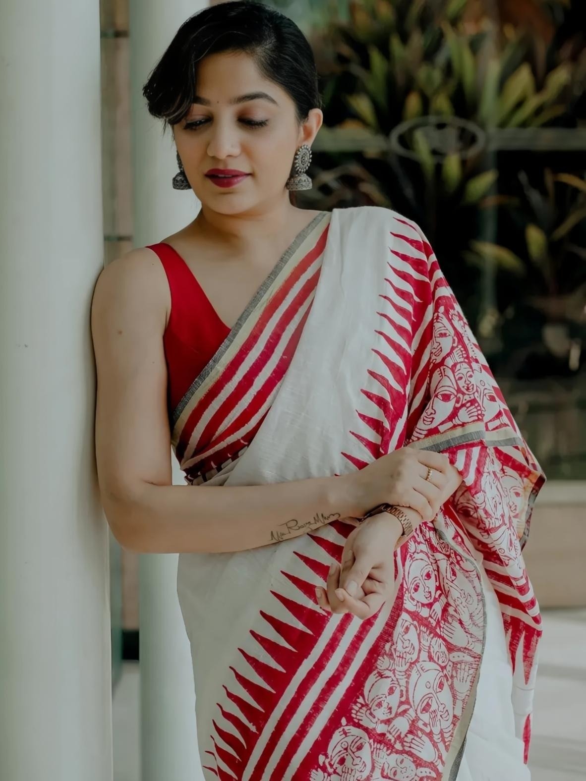 Trending Off-White & Red Linen Saree with Traditional Folk Art Print