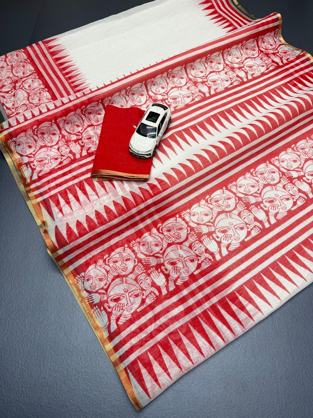 Trending Off-White & Red Linen Saree with Traditional Folk Art Print