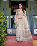 Elegant Off-White Linen Cotton Saree with Earthy Leafy Prints & Zari Border