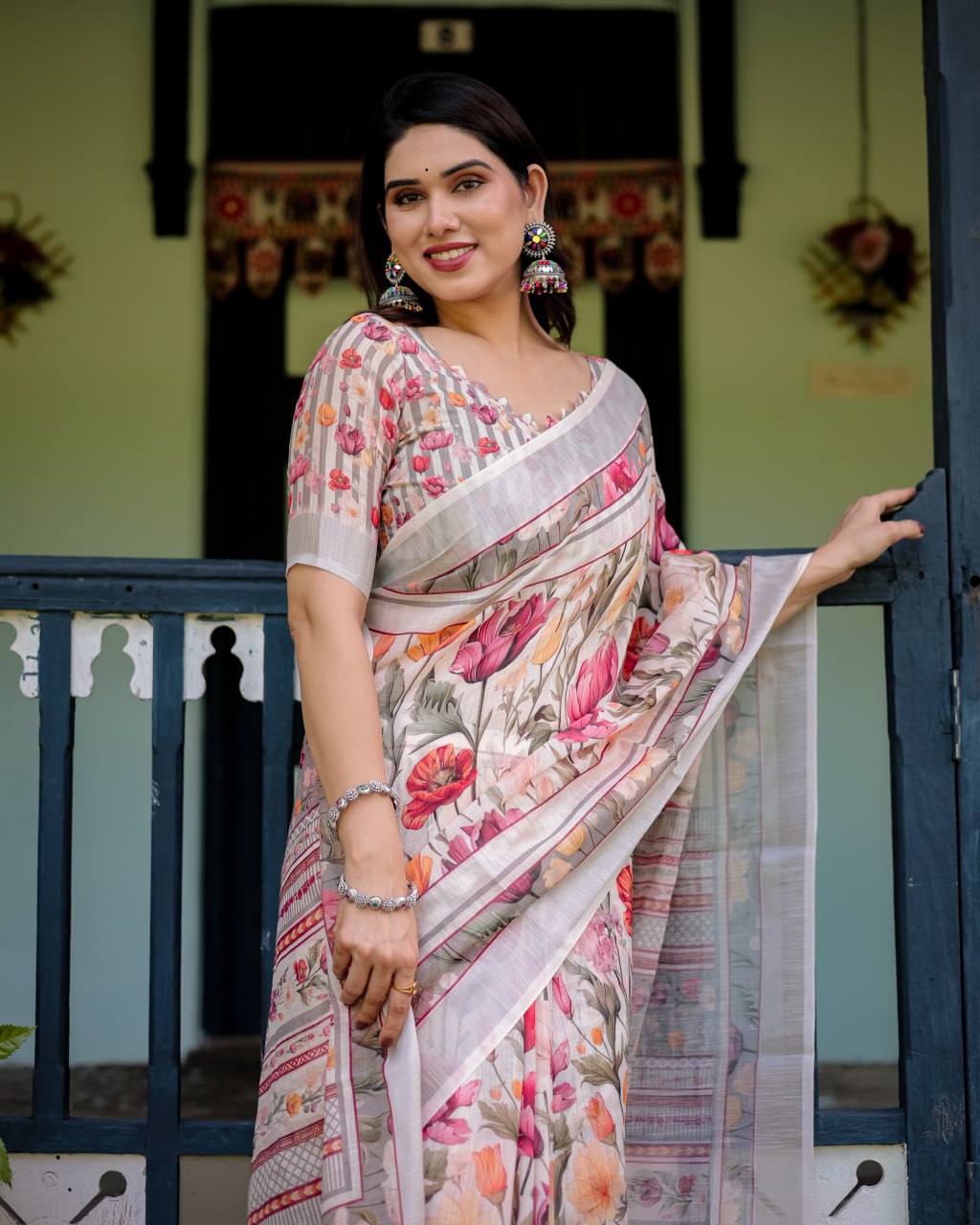 Graceful Off-White Linen Cotton Saree with Pink Floral Print & Zari Border